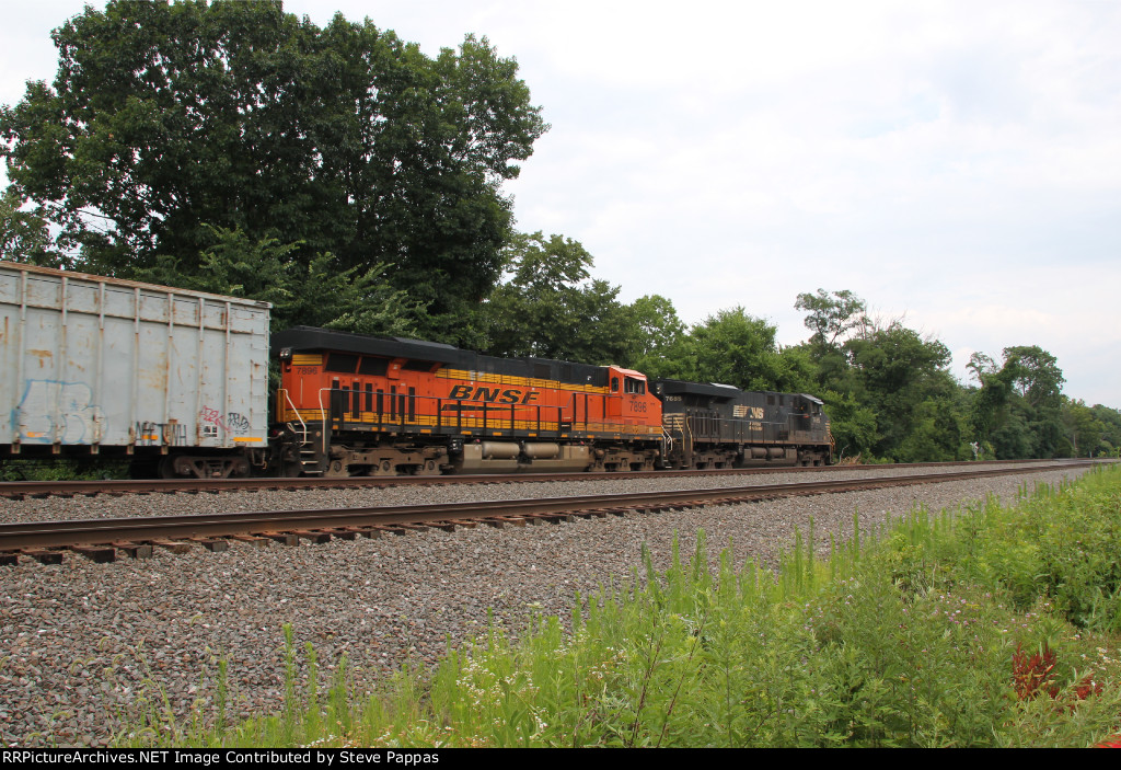 NS 7685 takes a freight East past MP 116